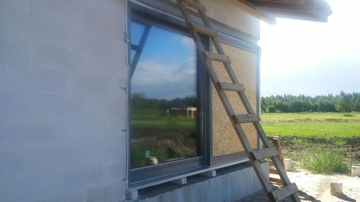 wooden windows installation at Meldrinu iela 36, Marupe